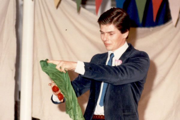 Young magician Tony Price in action at a party.